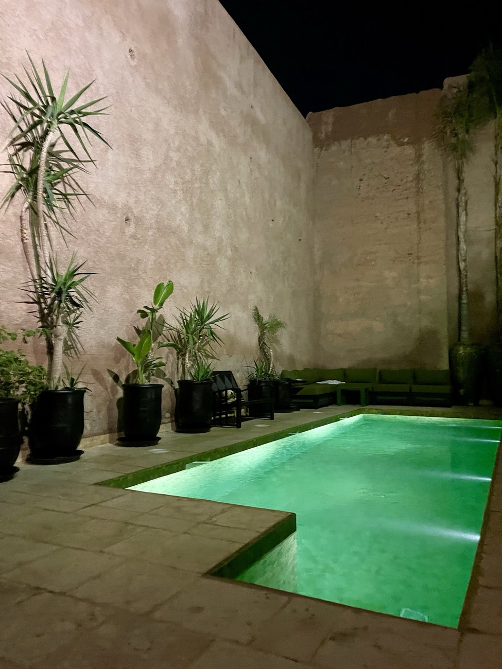 Illuminated pool at night, Morocco