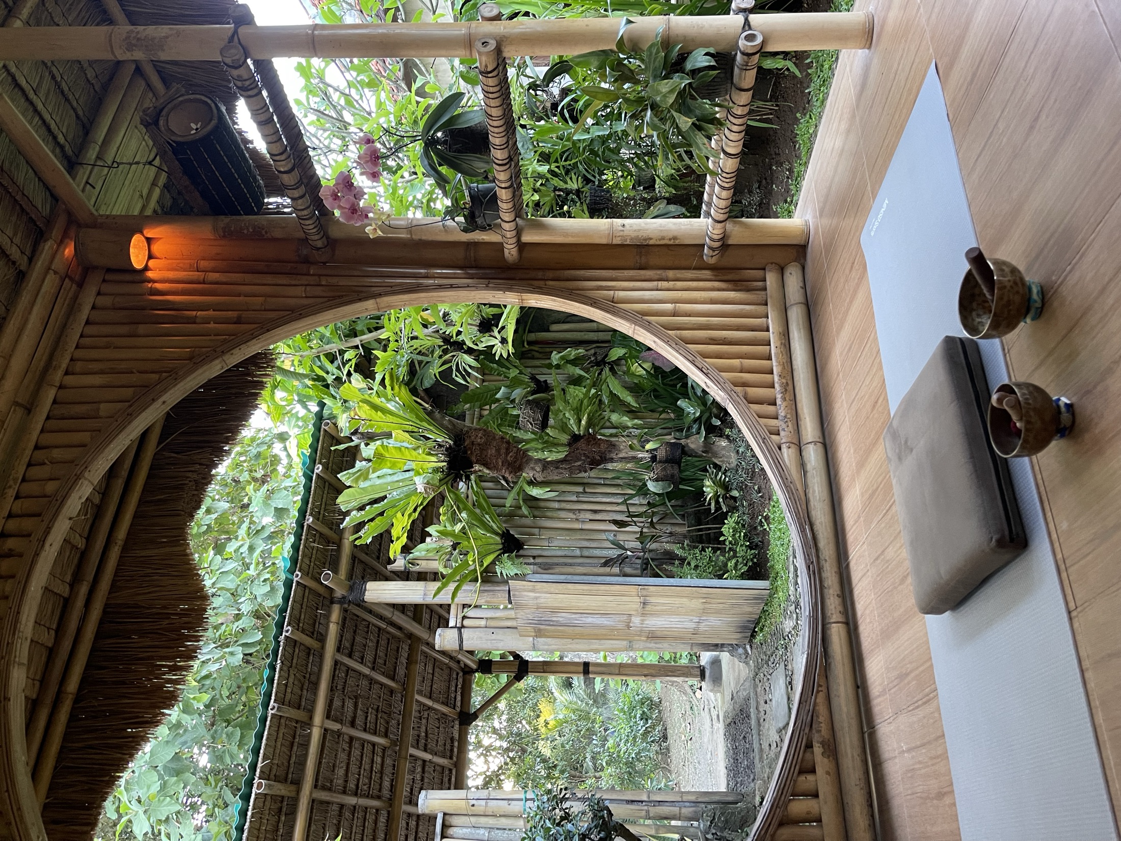 Circular window opening to the jungle, Bali